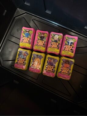 Mystery Mini Figures Tin Set - Pink & Yellow set of 8